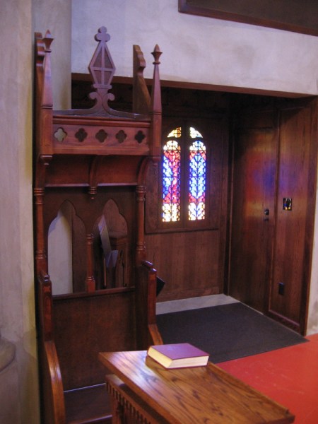 The cathedra, or bishop's throne, off to one side.
