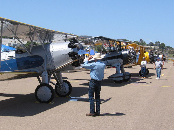 Checking out a row of shiny restored aircraft from the World War II era.