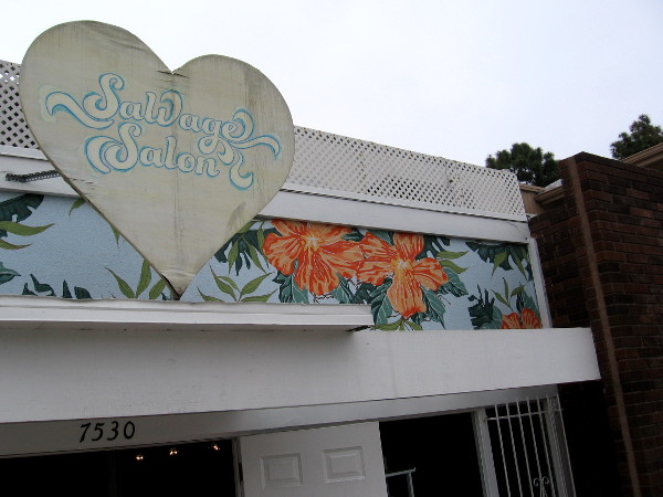 Painted flowers near the roof of Salvage Salon.