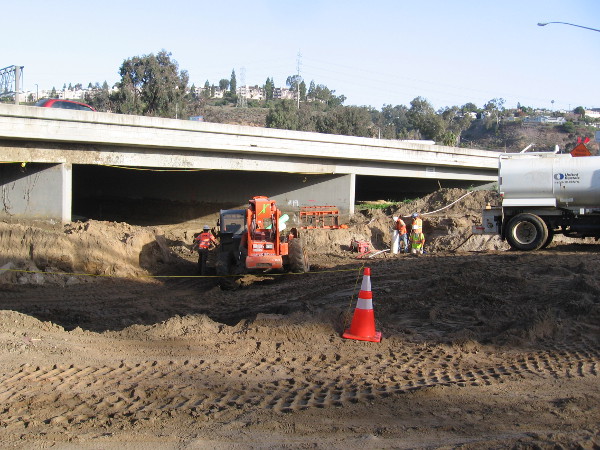 Heavy machinery sculpting the Earth.
