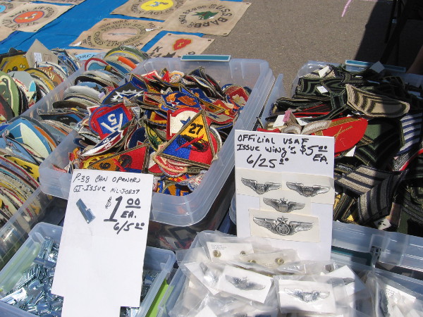 Aviation souvenirs and stuff for sale at the swap meet included pins and patches.