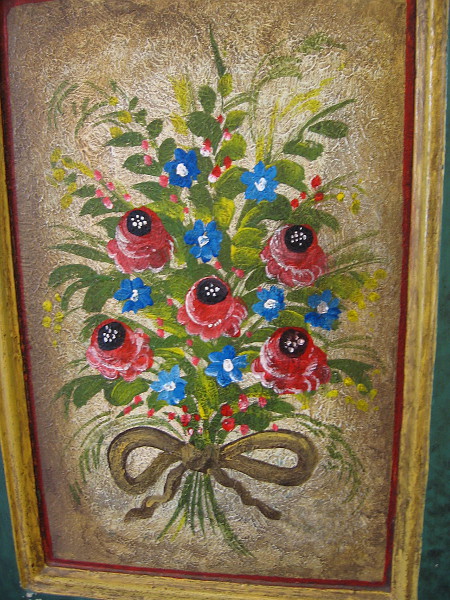 Painted flowers decorate a panel in the entry to the Cosmopolitan Hotel and Restaurant.