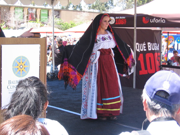 I believe this was said to be a dress from the Michoacán region. The shawl is an important aspect of the attire--it is used to send social signals.