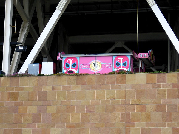 Lucha Libre masks peer down from an upper level of Petco Park.