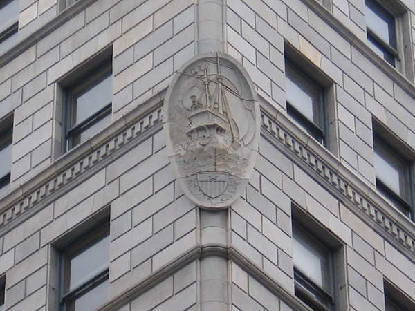 Medallion-like relief sculpture of explorer Cabrillo's galleon San Salvador on a corner of the 1924 John D. Spreckels Building.