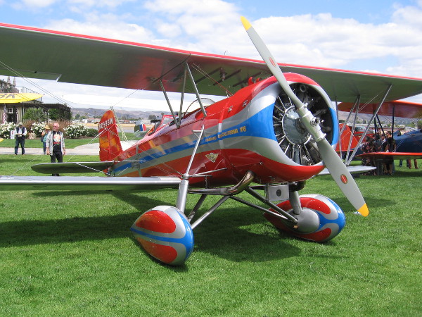 Another plane participating in the event awaits nearby.