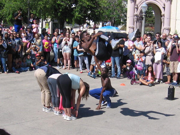 Street entertainment delights a crowd in Balboa Park's Plaza de Panama.