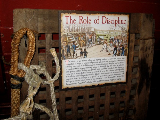The complex often stressful operation of a man-of-war required strict discipline. Punishments included flogging and gagging.