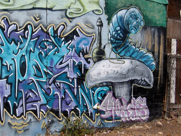 The blue Caterpillar on a mushroom smoking a hookah is from Alice in Wonderland.