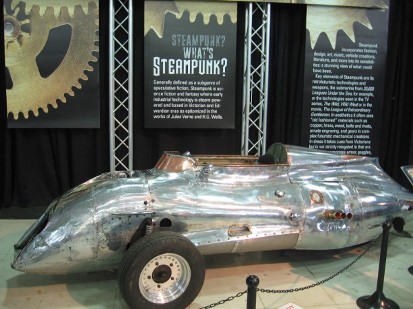 The Cyclops, a steampunk trike with a 3-cylinder Triumph Daytona engine, by artists Baron Margo and Jaime Martinez.