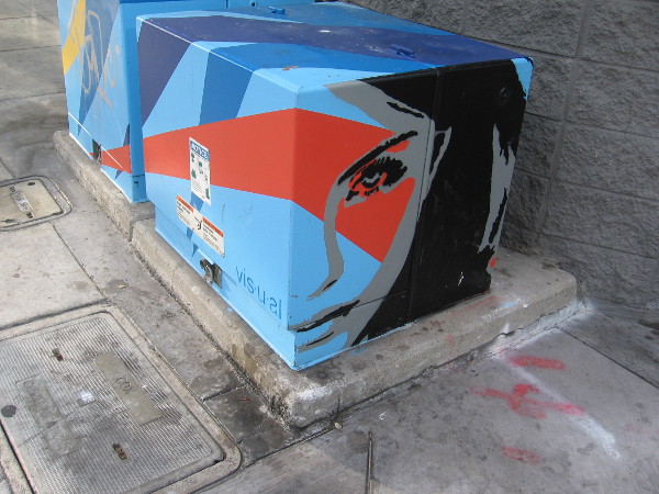 A face painted by VISUAL on a transformer box in downtown San Diego. I photographed this (and the following two boxes) while walking down A Street.