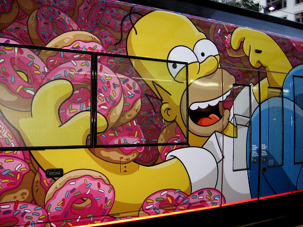 Homer Simpson is in sticky doughnut heaven! A colorful FOX trolley wrap for San Diego Comic-Con!