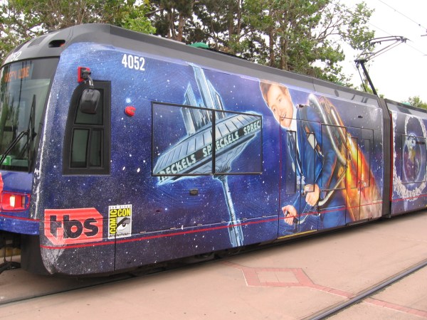 A trolley for 2018 San Diego Comic-Con has a wrap promoting the Conan show on TBS.
