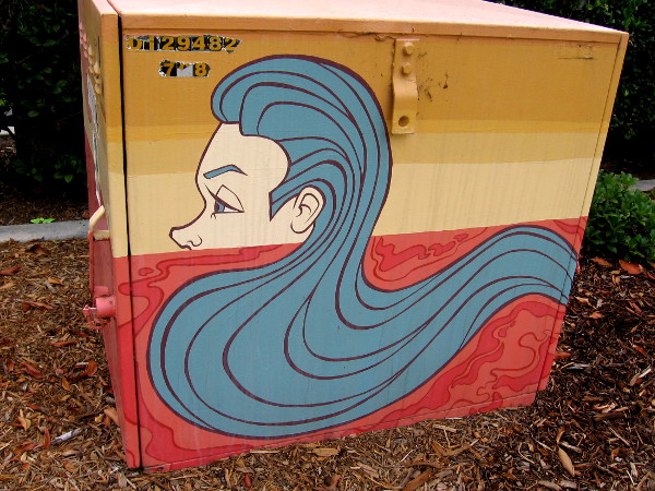 Long blue hair like waves of water.