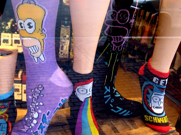 Homer Simpson and Rick and Morty socks in the window of the Find Your Feet store in the Gaslamp.