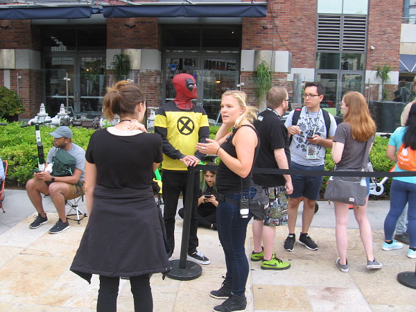 Deadpool is waiting in the DC Universe offsite line. He must like those dark DC characters.