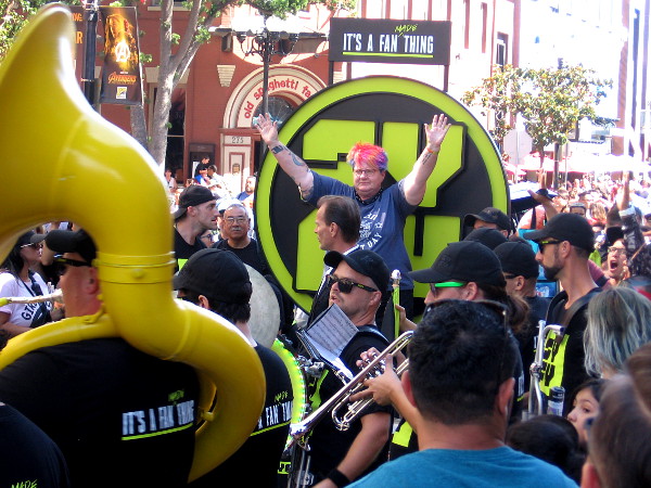 A fan at 2018 Comic-Con receives an award from Syfy in the Gaslamp on Saturday afternoon!