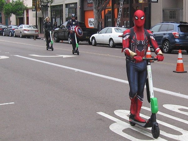 The Avengers' Quinjet must be out of action. Here comes Spiderman, Captain America and Black Widow on scooters!