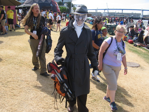 Rorschach cosplay. Somehow he could make the inkblot on his mask change appearance.