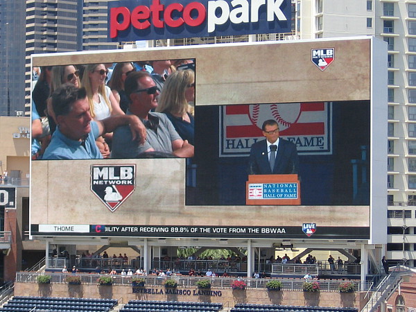 He adresses his brothers, who are watching the ceremony at Cooperstown.