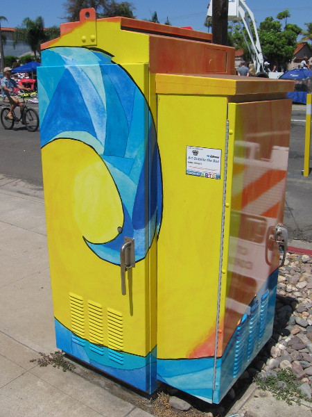 Surf breaks on a utility box. Coronado is not a true island, even if it's almost entirely surrounded by water.