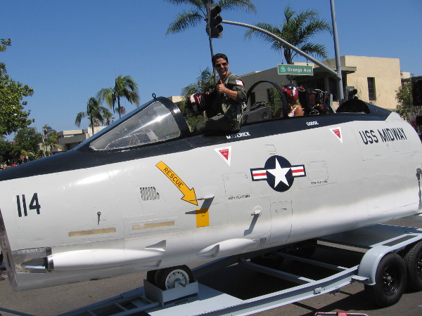I think I see Maverick of Top Gun in that cockpit! No, it's actually a friendly young Tom Cruise look-alike who I've seen posing for photos by the USS Midway Museum.