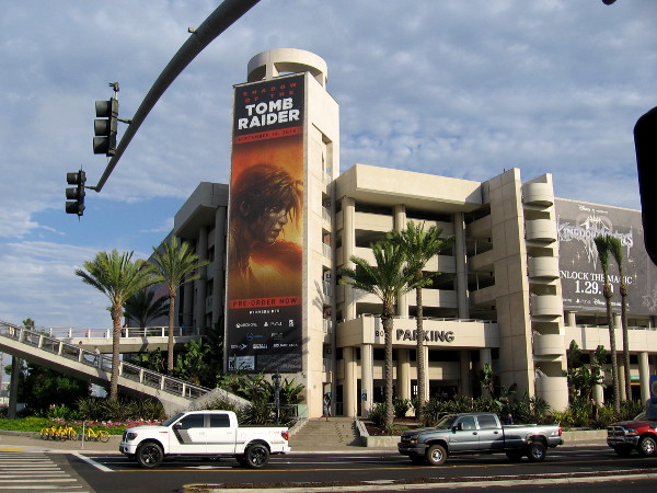 A prominent banner facing downtown promotes the upcoming video game Shadow of the Tomb Raider.