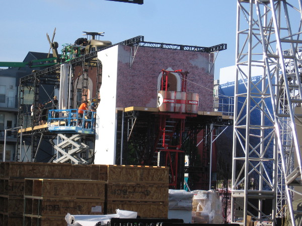 The huge helicopter now stands near a building whose doors have Moorish-looking arches.