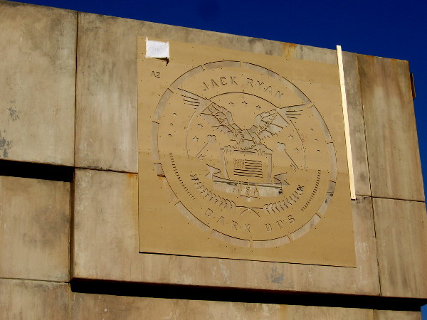 A huge bunker-like escape room in one corner of the Jack Ryan Experience has a cool seal. JACK RYAN DARK OPS.