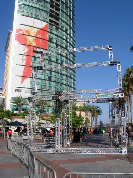 A wrap on the Omni Hotel promoting The Gifted, above initial construction of an NBC offsite near the Tin Fish. Fans will experience The Good Place.