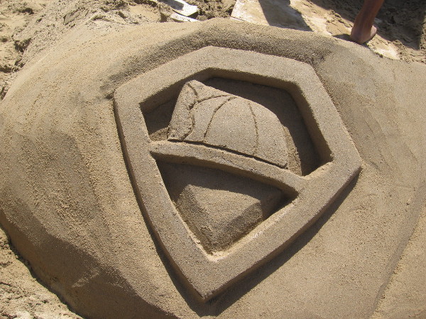 The I.B. Posse created a new chest emblem for Superman. It features a firefighter's helmet.