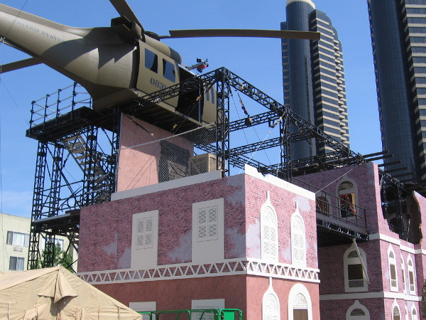 I learned visitors will climb to the helicopter, descend by wire to a top floor, then head over to the zip line. Once on the ground, there's more training to do involving some sort of vehicles.