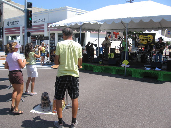 People watch the Lemon Squeezers play rock and roll music with a twist!
