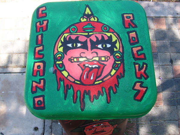 Chicano Rocks--looks sort of like an Aztec version of the rock band KISS.