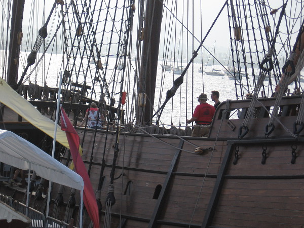 People enjoy a look inside the Spanish galleon replica San Salvador.