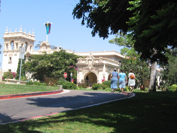 Visitors to Balboa Park walk toward the Plaza de Panama.