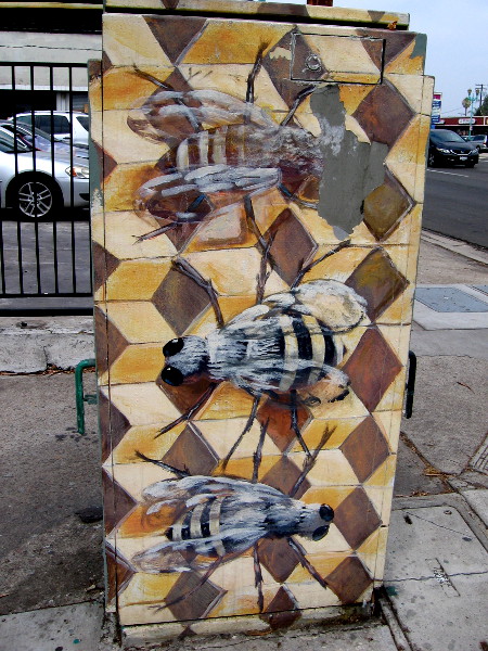 Bees in a hive on this eye-catching electrical box.