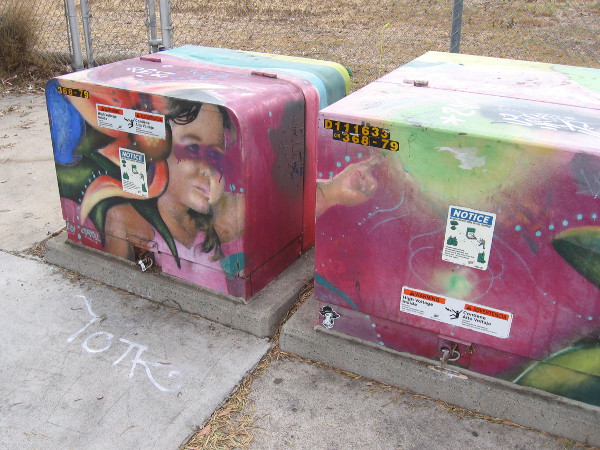 A child reaches out to touch a bright green essence.