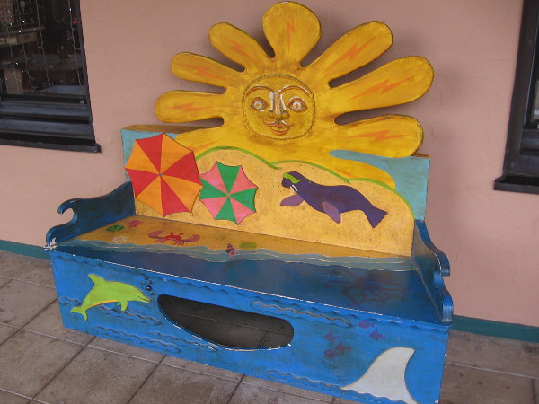 A cheerful sun, beach and ocean bench at Liberty Station in Point Loma.