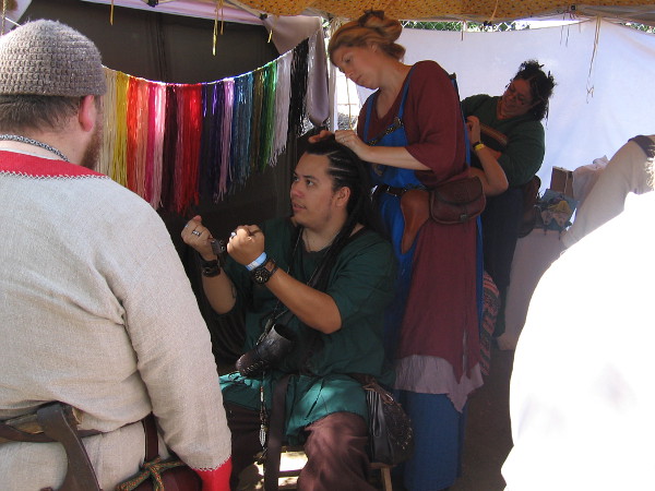 Hair braiding could be observed everywhere. I was told the length of a Viking's hair was often proportionate to their social status. Elaborate braids would be tended by servants.