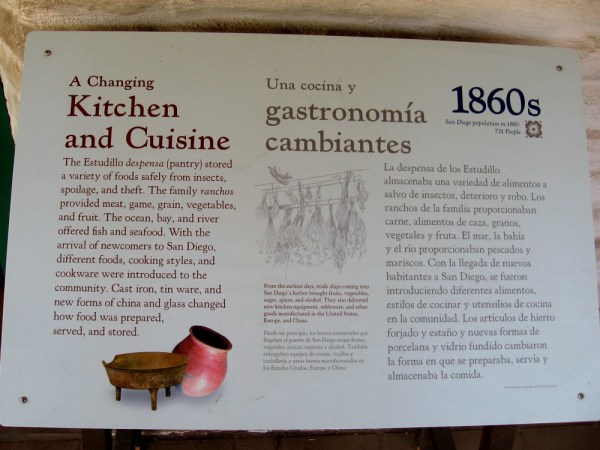 Sign describes the Estudillo kitchen and pantry. The family's ranchos provided meat, game, vegetables and fruit.