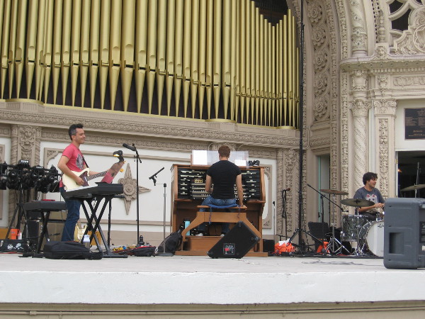 San Diego Civic Organist Raúl Prieto Ramírez rehearses Stairway to Heaven with a rock band for tonight's final International Summer Organ Festival concert.