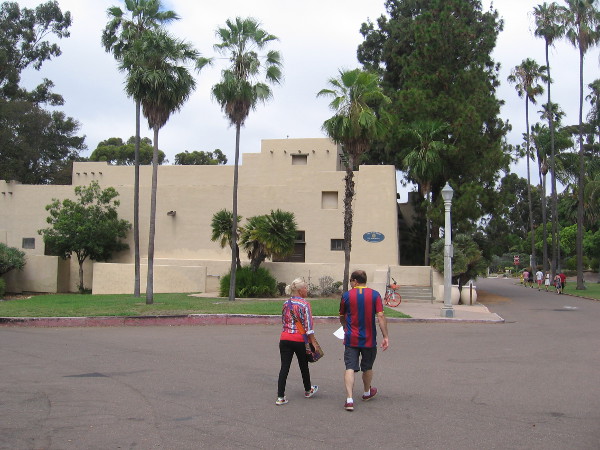 Walking through Pan American Plaza between the San Diego Automotive Museum and nearby Recital Hall.