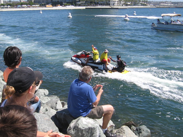 One of the athletes is cheered by the crowd after making their dramatic swoop!