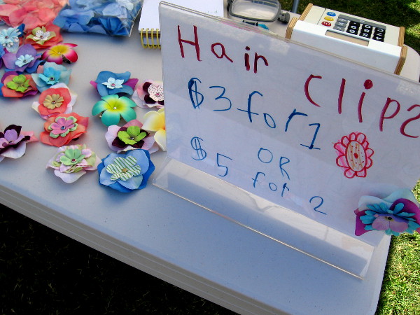Another very young entrepreneur made some very pretty flower hair clips.