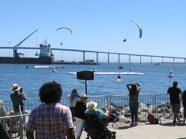 The two paragliders slowly approach the platform. I always enjoy watching paragliders cruise above the beach at the Torrey Pines Gliderport.