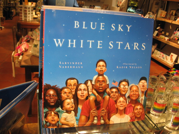 The Spectacle, 2016, gracing the front cover of Blue Sky, White Stars, was painted by Kadir Nelson.
