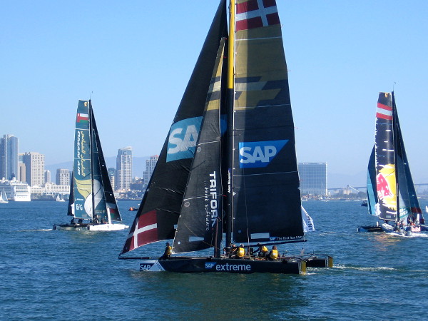 Hydro-foiling GC32 catamarans race across San Diego Bay during the 2018 Extreme Sailing Series.