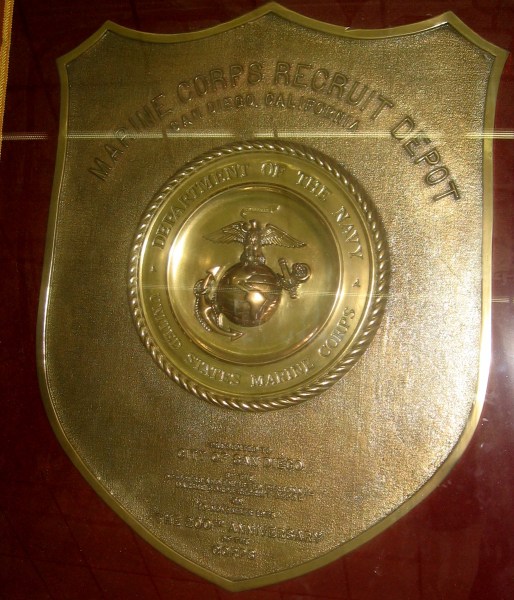 A closer photo of the shining brass plaque, which is on display inside the lobby of the San Diego City Administration Building.