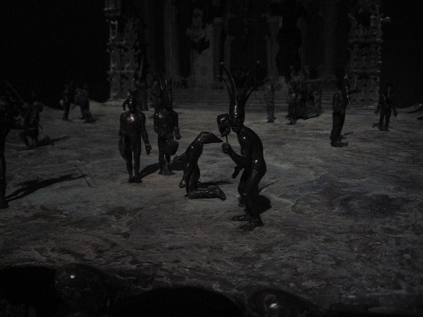 Close photo of bronze figures of Tim Shaw's Middle World.